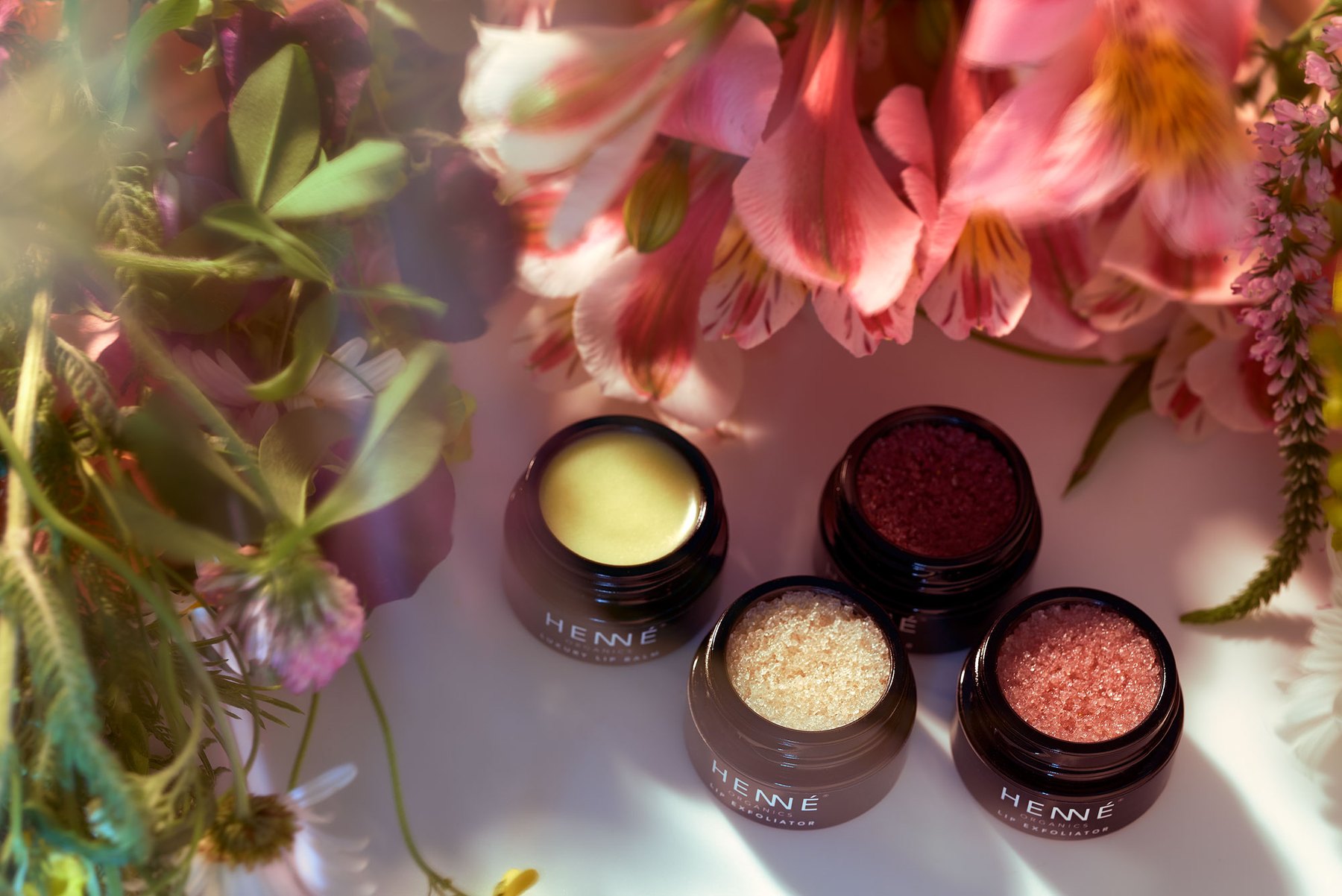 Open jars among petals